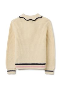 Pull en tricot de couleur crème, avec un col festonné, des bordures noires et des accents rayés en marine et rose au niveau de la taille et des poignets.