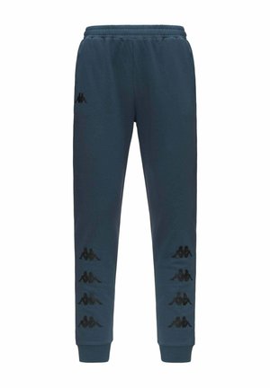 Pantalon de jogging bleu marine avec taille et poignets élastiques, avec des logos de marque noirs sur les côtés et près de la taille.