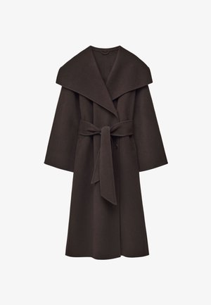 Brown wool coat with large collar, wide sleeves, and a belted waist. Features a single button closure and a textured finish.