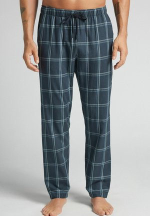 Pantalons de pyjama bleu marine avec un motif à carreaux comportant des lignes bleu clair, taille élastique et cordon de serrage. Fabriqués à partir d'un tissu doux et respirant.