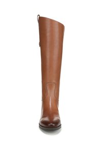 Botte en cuir marron jusqu'au genou avec une finition lisse, un haut incurvé et un détail de couture sur le côté. Dotée d'une languette à l'arrière.