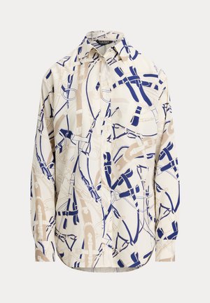 Chemise à boutons en crème avec des motifs abstraits bleus et beiges. Comprend un col classique et des manches longues, fabriquée à partir d'un tissu léger.