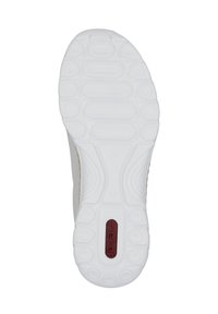 Semelle en caoutchouc blanc avec des motifs texturés et des grips circulaires ; présente une touche de logo rouge près du talon.