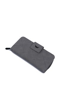 Gray quilted wallet with a zip closure and a snap-button flap. Features a discreet logo and a smooth texture. Rectangular shape.