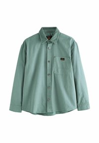 Langärmliges Hemd in gedämpftem Grün, aus Baumwolle. Verfügt über eine Knopfleiste, eine Brusttasche und einen Cordkragen. Dezente Nähte.