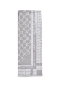 Écharpe grise à motif avec un tissage texturé, présentant un design en boucle et des accents imprimés "JOOP !" le long des bords. Les bords sont frangés.