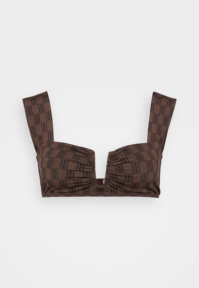 Brown patterned bandeau bikini top with a ruched design, wide straps, and a front cut-out detail. Made from smooth, stretchy fabric.