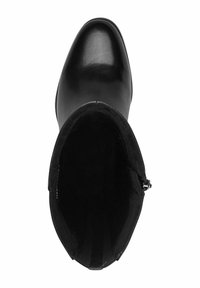 Black leather ankle boot with a smooth finish, rounded toe, and interior lining. Features a side zipper and a soft textile collar.