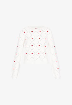 Bílý pletený svetr s červenými srdcovými vzory a diamantovým designem. Má dlouhé nabírané rukávy a pružný lem.