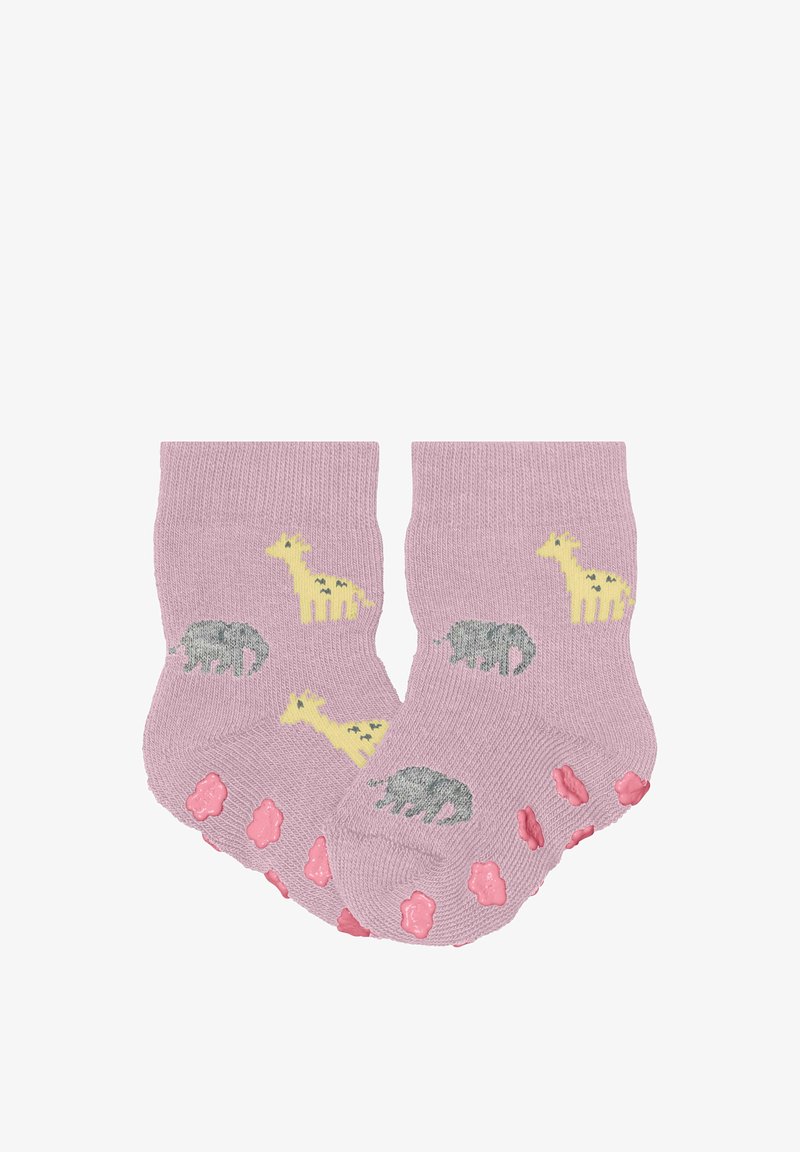 Chaussettes pour bébé roses avec des crampons antidérapants, ornées de motifs de girafe jaune et d'éléphant gris.
