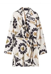 Robe portefeuille en tissu crème avec un motif abstrait noir et doré audacieux, manches longues et détail à nouer à la taille.