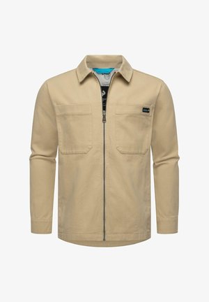 Beige long-sleeve shirt with a front zipper, two chest pockets, and a collar. Fabric has a smooth texture with a subtle sheen.
