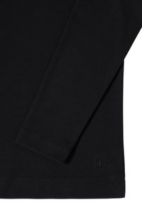 Black long-sleeve shirt made of smooth fabric. Features a stitched hem and a small embossed logo in the lower corner.