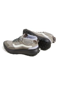 High-top sneakers in gray with white accents. Features a textured sole, patterned laces, and mesh details on sides for breathability.