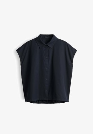 Chemise noire à manches courtes avec boutons, col et coupe ample, présentée à plat sur fond blanc.