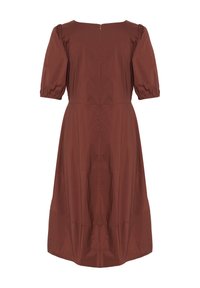 Ruda, iki kelių ilgio suknelė su trumpomis pūstomis rankovėmis, apvaliu iškirpimu ir užtrauktuku nugaroje. Pagaminta iš lygaus, vientiso audinio.