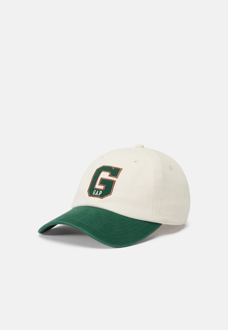 White baseball cap with green visor, featuring a "GAP" logo in dark green and orange. Made of fabric with a stitched design on the front.