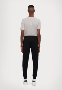 EA7 Emporio Armani TUTA SPORTIVA - Tracksuit - sand/black