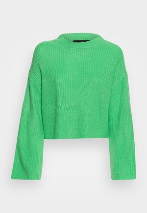 Pull tricoté vert vif à manches longues et col rond, raccourci à la taille, présenté sur un fond uni.