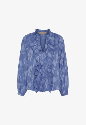 Lyseblå bluse med lange ærmer, flæsekant ved halsudskæringen, blomsterprint og tekstureret stof. Har knapmanchetter og en V-udskæring.