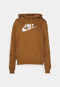 Brun huvtröja med känguruficka, ribbade muddar och en stor vit Nike-logotyp på framsidan. Mjuk tygtextur.