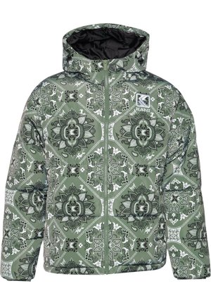 Padded green jacket with a hood, featuring a black and white intricate floral pattern. Front zipper and logo on the left chest.