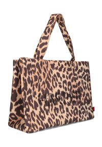 Sac fourre-tout en imprimé léopard avec une conception robuste, présentant des lettres en strass écrivant "HARPER" en noir. Fabriqué en tissu texturé avec des poignées doubles.