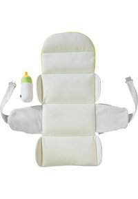 Padded baby carrier in cream fabric with a smooth texture and adjustable straps. Includes a small bottle with a green and yellow cap.