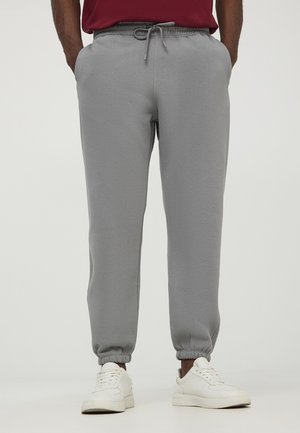 - Spodnie treningowe