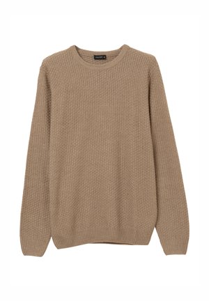 Pull en maille beige avec une texture côtelée, un col rond et des manches longues. Présente une forme rectangulaire et des détails de style subtils.