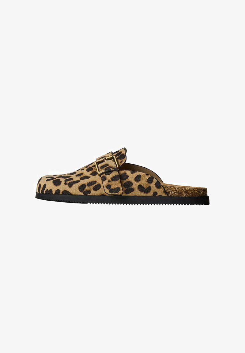 Leopard-print slip-on clogs in tan and black suede, featuring a gold-tone buckle and a cork-accented footbed with a textured black sole.