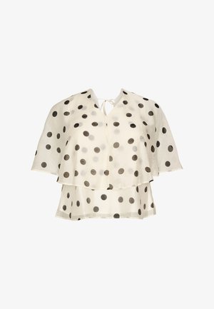 Biała przezroczysta bluzka w czarne groszki, z warstwowymi krótkimi rękawami i wiązaniem przy dekolcie w kształcie litery V.