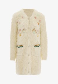 Kijelölve, wollweiss