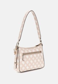 Sac à main beige avec un motif floral blanc, poche avant zippée, quincaillerie dorée et une sangle plate. Matériau texturé avec des bordures noires.