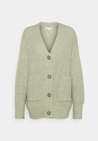 Světle zelený pletený cardigan s véčkovým výstřihem, čtyřmi hnědými knoflíky, dlouhými rukávy a dvěma předními kapsami.