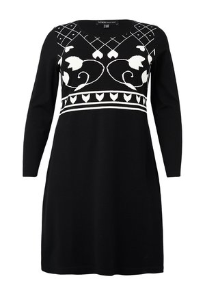 Langærmet sort kjole med hvide blomster- og geometriske mønstre over bryst og talje, designet til et stilfuldt look.