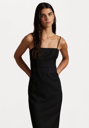 Black, fitted dress featuring thin straps, a square neckline, textured bodice with horizontal pleats, and a smooth, tailored silhouette.