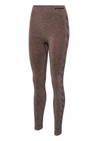 Bruine leggings van elastisch materiaal met een textuur die een subtiel gemêleerd patroon vertoont. De tailleband heeft een klein logo aan de voorkant.