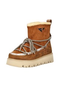 Stivale in suede marrone per l'inverno con fodera in morbida pelliccia crema, suola spessa beige, lacci decorati avvolti e logo Replay sul lato e sul tirante.