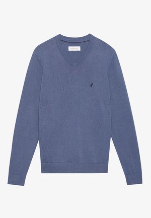 Tume sinine V-kaelusega sviiter, valmistatud tekstuurilisest kudumikoest. Omab pikki varrukaid ja väikest logo rinnal. Viimistletud varrukate ja helmaga.