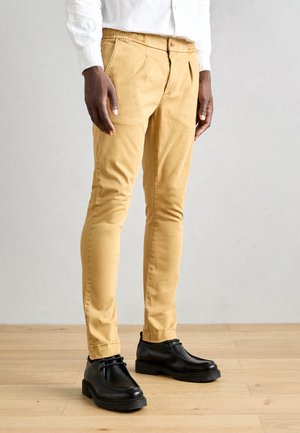 Chinos - bistre