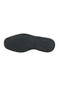 Suela de zapato de goma negra con superficie de agarre texturizada, que presenta recortes circulares y un borde liso. Diseño resistente y flexible para mayor comodidad.