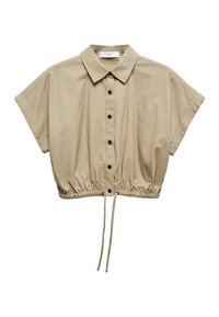 Camicia beige corta con colletto, maniche corte e orlo inferiore arricciato con cordoncino. Bottoni neri disposti sul davanti.