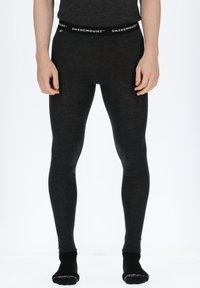 Schwarze thermische Leggings aus einem weichen, strukturierten Stoff, mit einem markierten Bund und einem schmalen Design, das sich den Beinen anpasst.