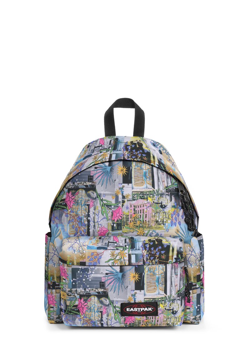 Backpack made of durable fabric, featuring a colorful collage pattern with floral and geometric designs, one front pocket, and a top handle.