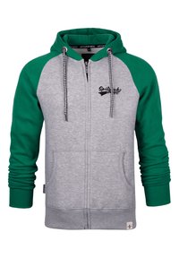 Grau zip-up Kapuzenpullover mit grünen Raglanärmeln. Verfügt über eine Kordelzugkapuze, Schachbrettakzente und Fronttaschen. Weicher Stoff.