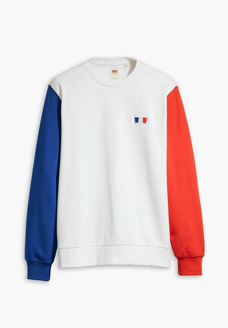 Sweatshirt blanc avec des manches bleues et rouges, présentant un petit logo brodé en bleu, rouge et blanc. Fabriqué en coton doux.
