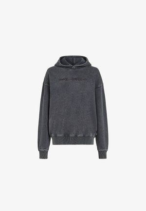 Grå huvtröja i mjukt tyg, med logotyp fram, ribbade mudd och nederkant. Något oversized med en avslappnad passform.