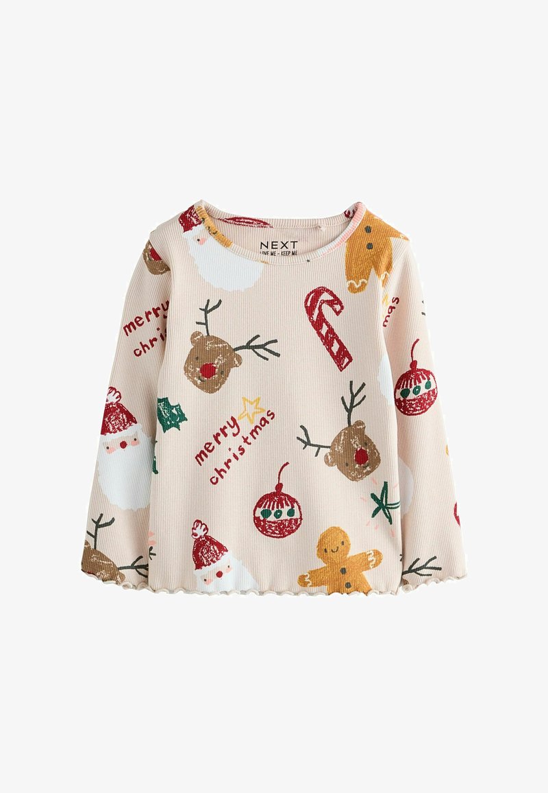 Maglietta a maniche lunghe beige chiaro con texture a coste, decorata con stampe colorate a tema natalizio: Babbo Natale, uomini di pan di zenzero, decorazioni e bastoncini di zucchero.