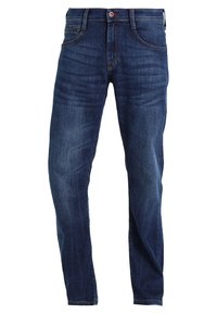 Jeans i denim i mörkblått, med en klassisk rak passform, fem fickor och subtila blekningar på tyget för struktur.